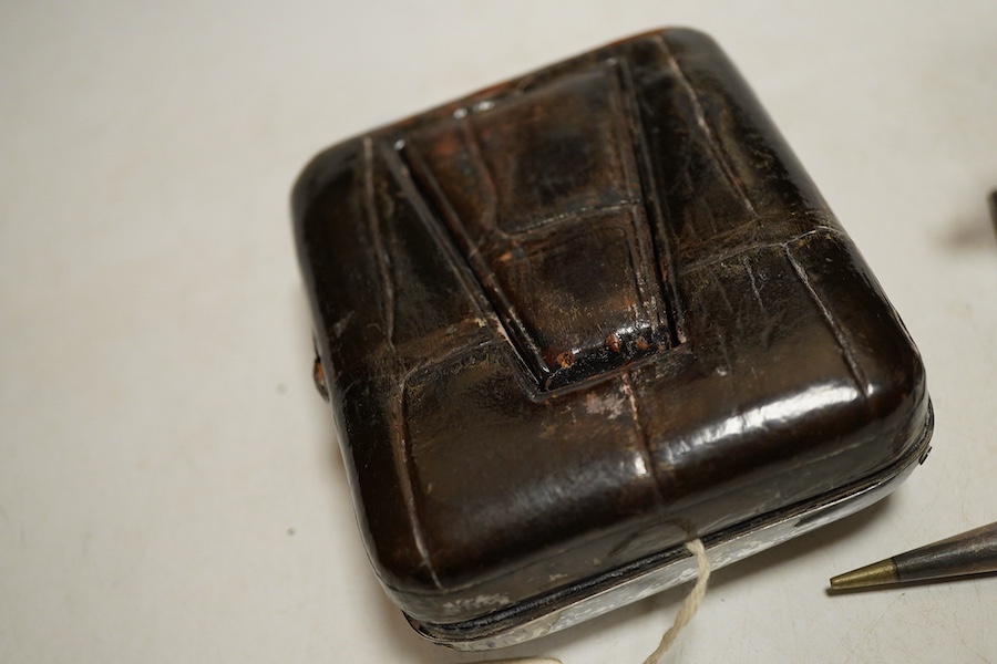 An Edwardian silver perpetual desk calendar, Birmingham, 1907, E F Braham, initalled, (mechanism a/f) together with an engine turned propelling pencil and a Swiss open faced poclet watch contained within a silver faced l